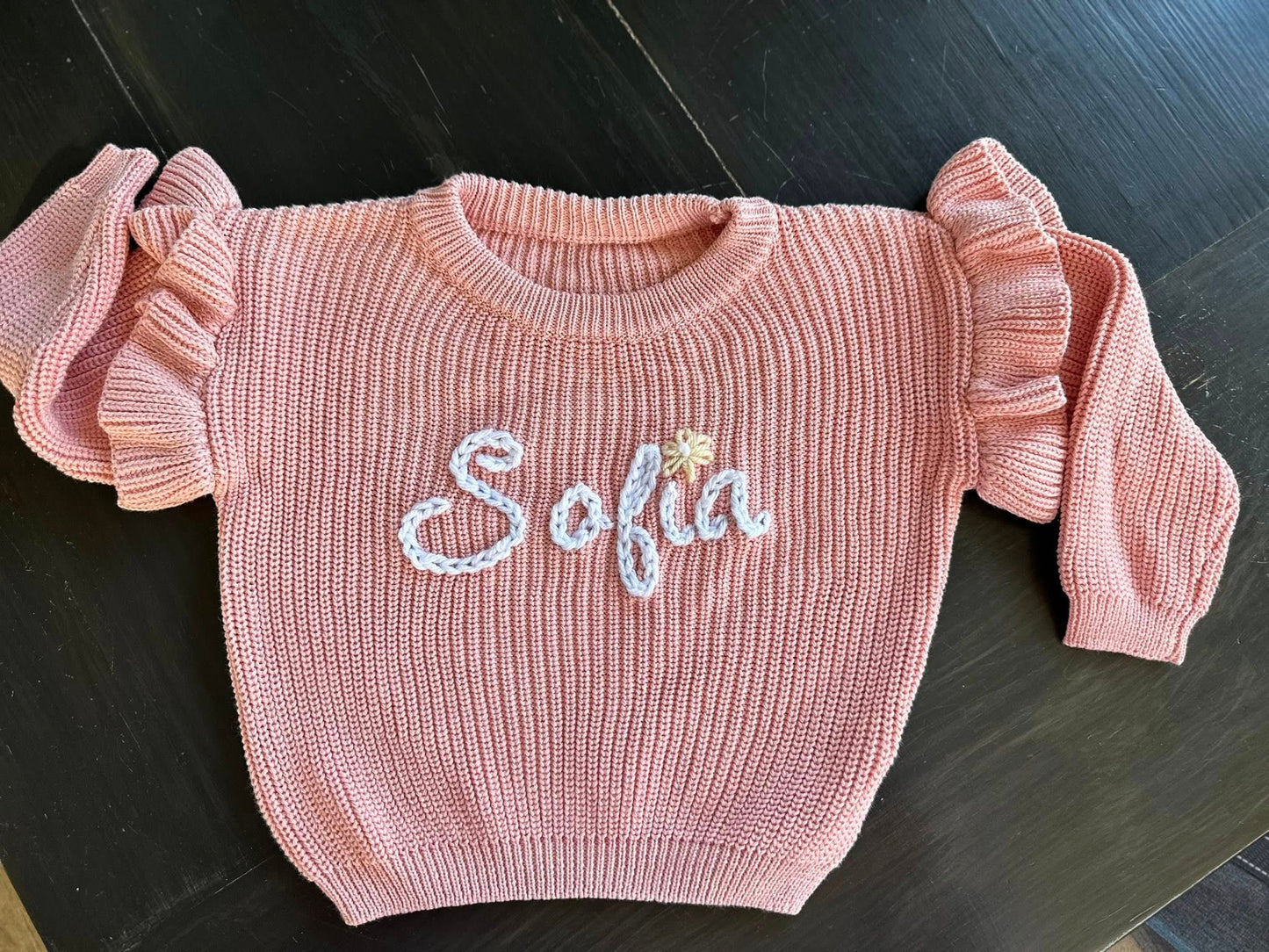 Hand embroidered name sweaters