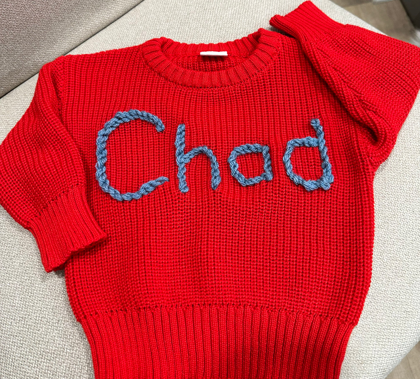 Hand embroidered name sweaters